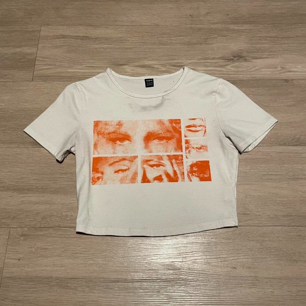 WHITE/ORANGE GRAPHIC CROP TOP